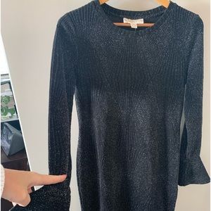 Size large Michael Kors Shimmery dress fits more like a med.